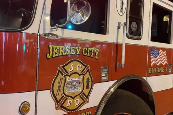 Unconscious Baby and Teen Sister Rescued by Jersey City Firefighters; Dog Died from Blaze (1)